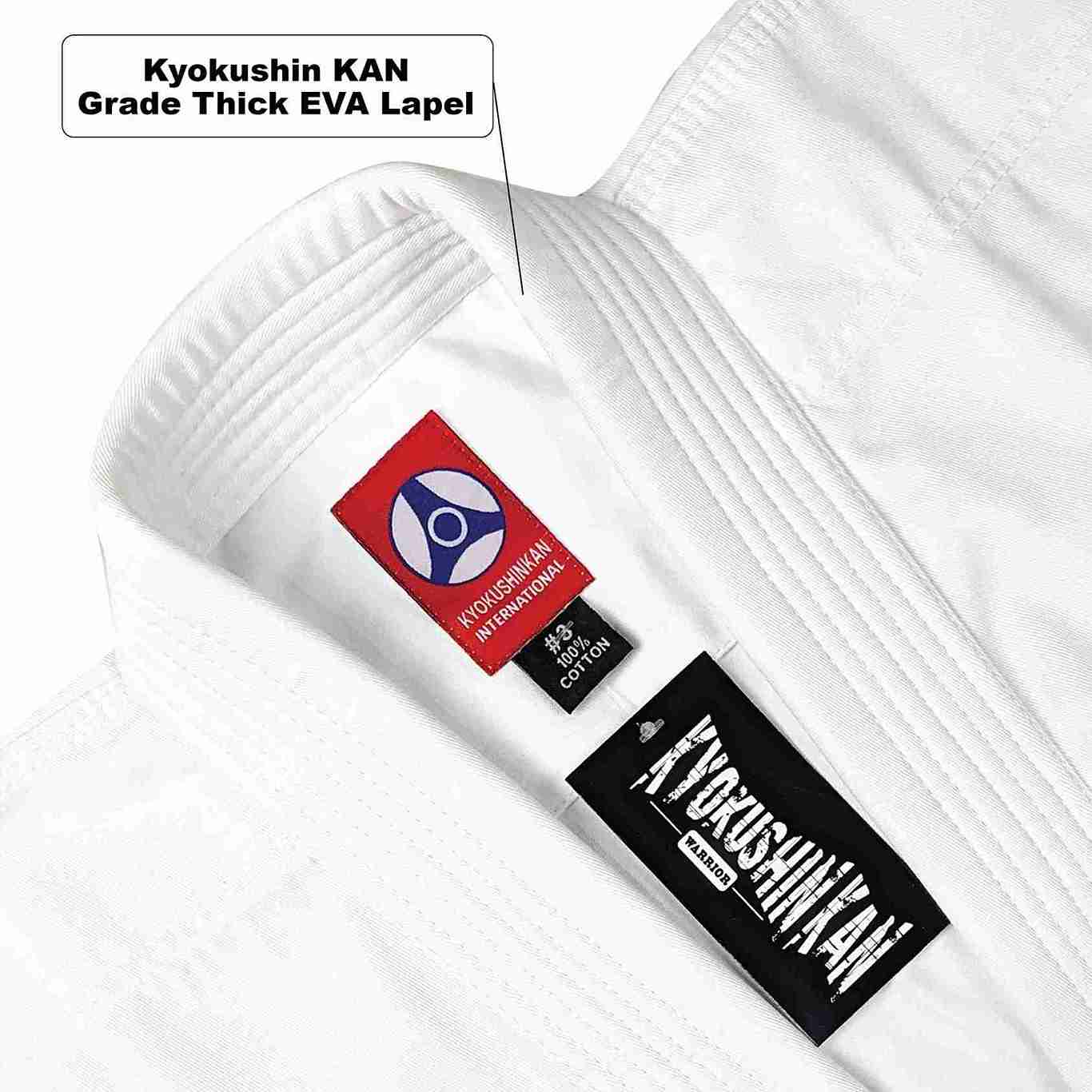 Close-up of a white Kyokushin KAN martial arts gi lapel showing two Kyokushin KAN brand labels, including one red and one black tag, with a text callout reading 'Kyokushin KAN Grade Thick EVA Lapel'.