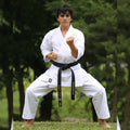 Bleached 12 oz stretch cotton men’s karate gi in white, heavyweight training fabric.