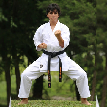 Bleached 12 oz stretch cotton men’s karate gi in white, heavyweight training fabric.